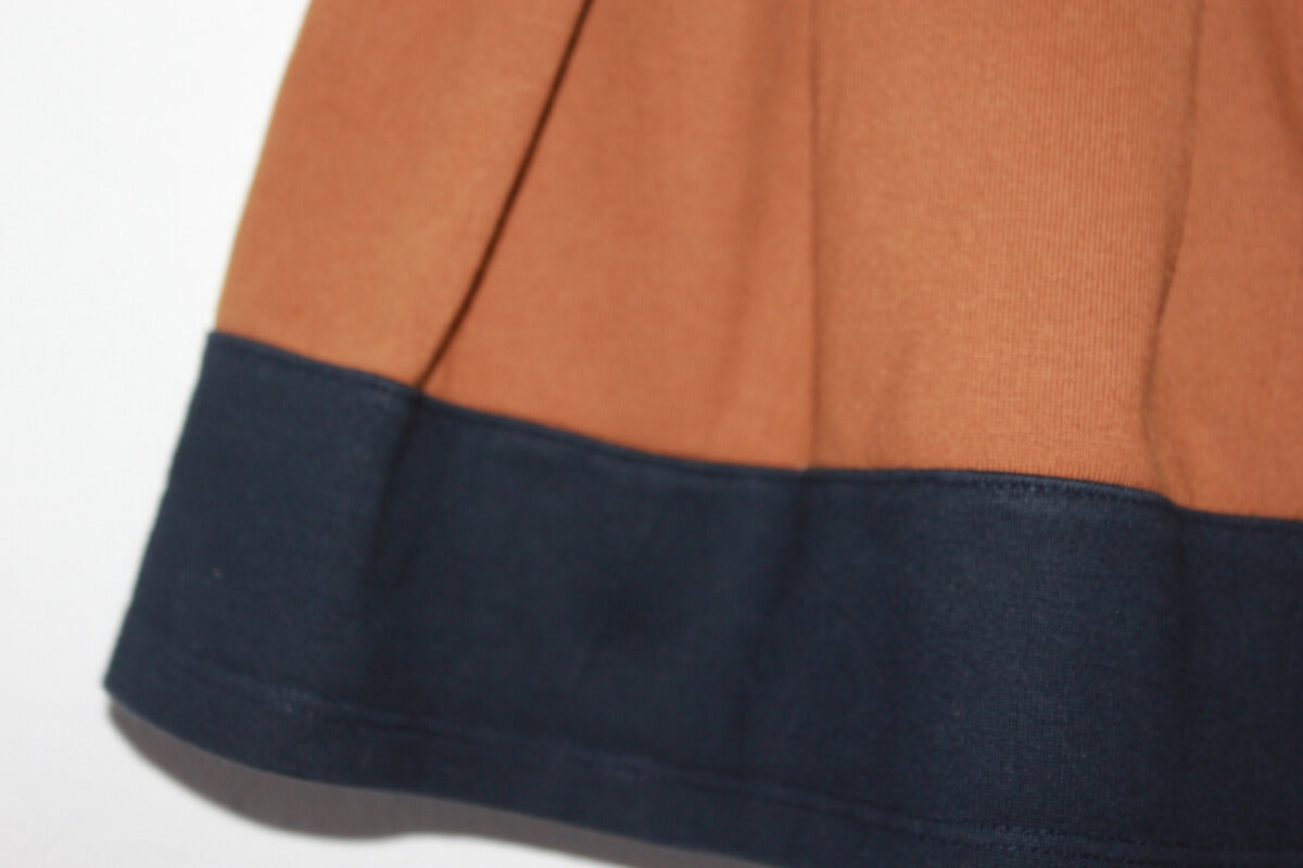 tweedehands katoenen lichtbruine rok met donkerblauwe rand aan de onderkant van petit bateau in maat 110-116