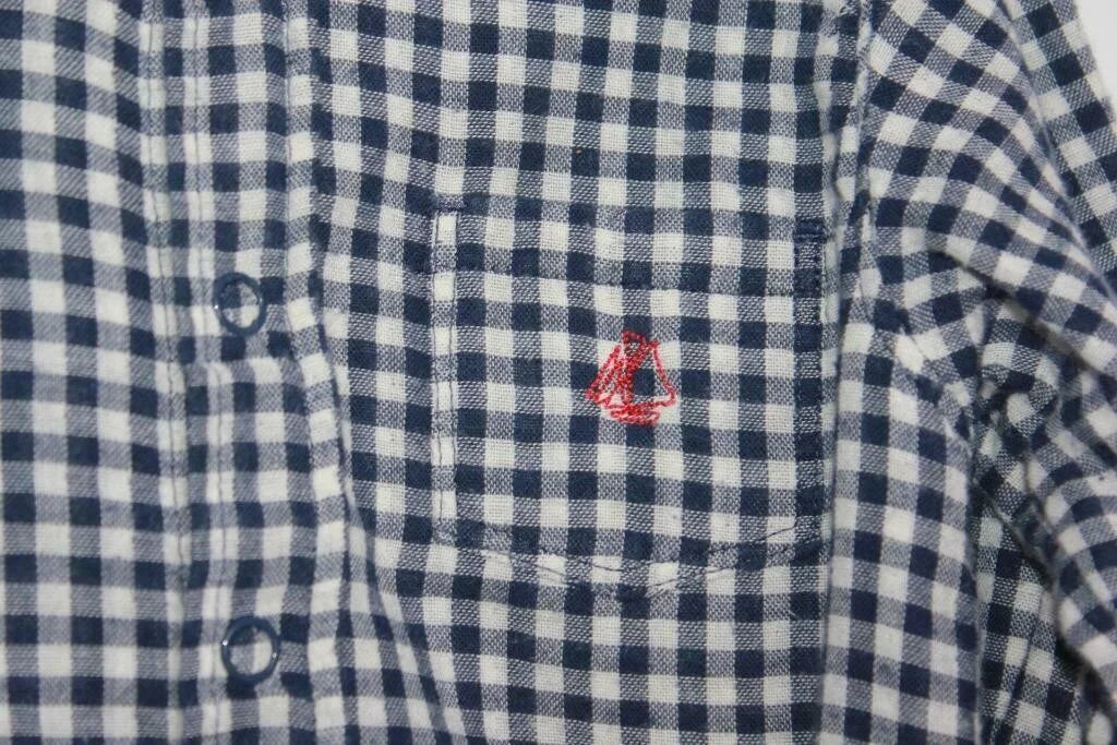tweedehands katoenen donkerblauw met wit geruit overhemd van petit bateau in maat 110 voor een jongen